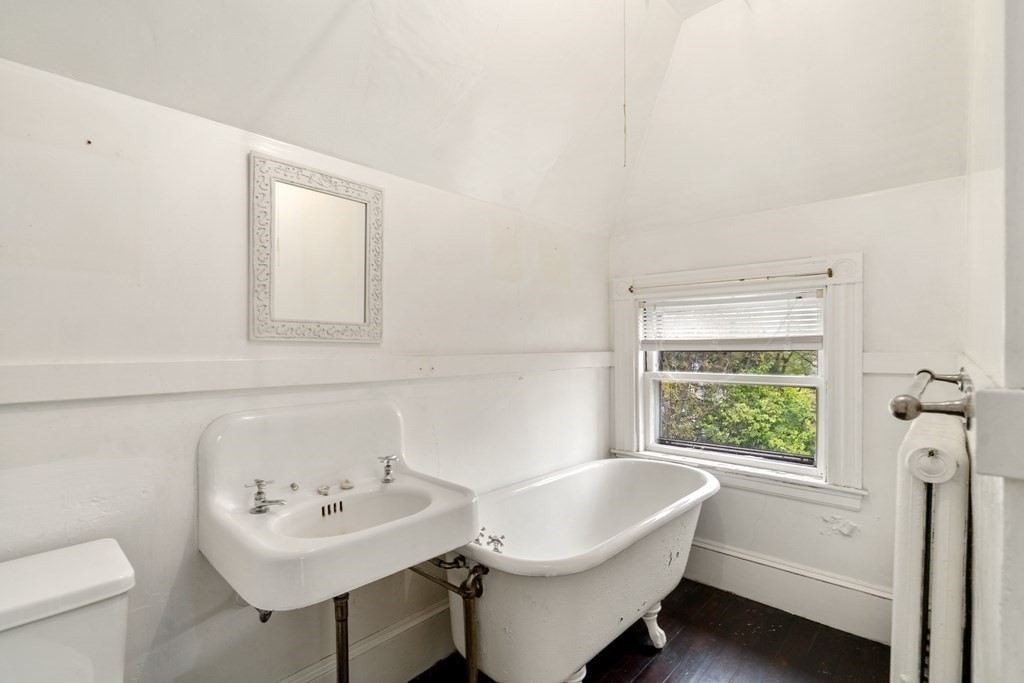 13 Ravine Street Arlington, MA 02476 - Photo 17 of 42 a bathroom with a sink toilet and a mirror