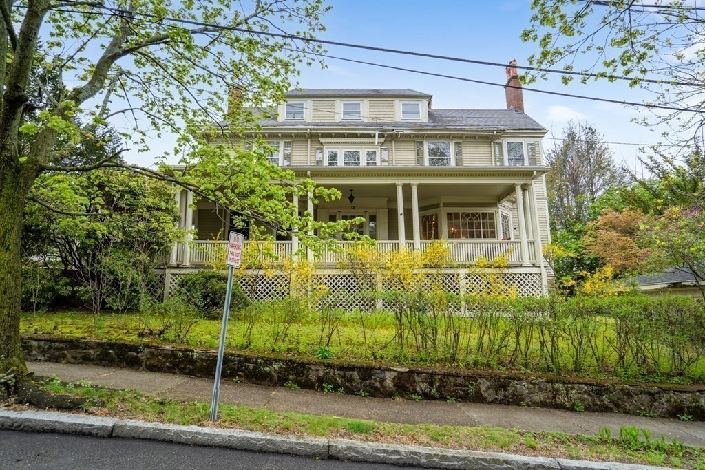 13 Ravine Street Arlington, MA 02476 - Photo 2 of 42 a front view of a house with a yard