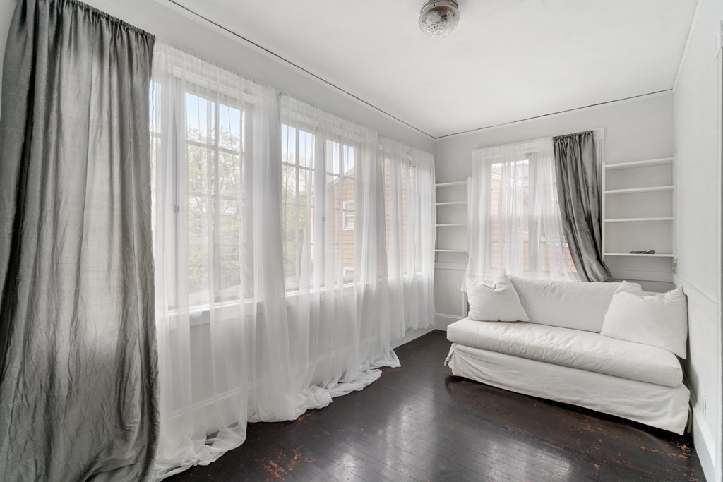 13 Ravine Street Arlington, MA 02476 - Photo 22 of 42 a living room with furniture and a large window