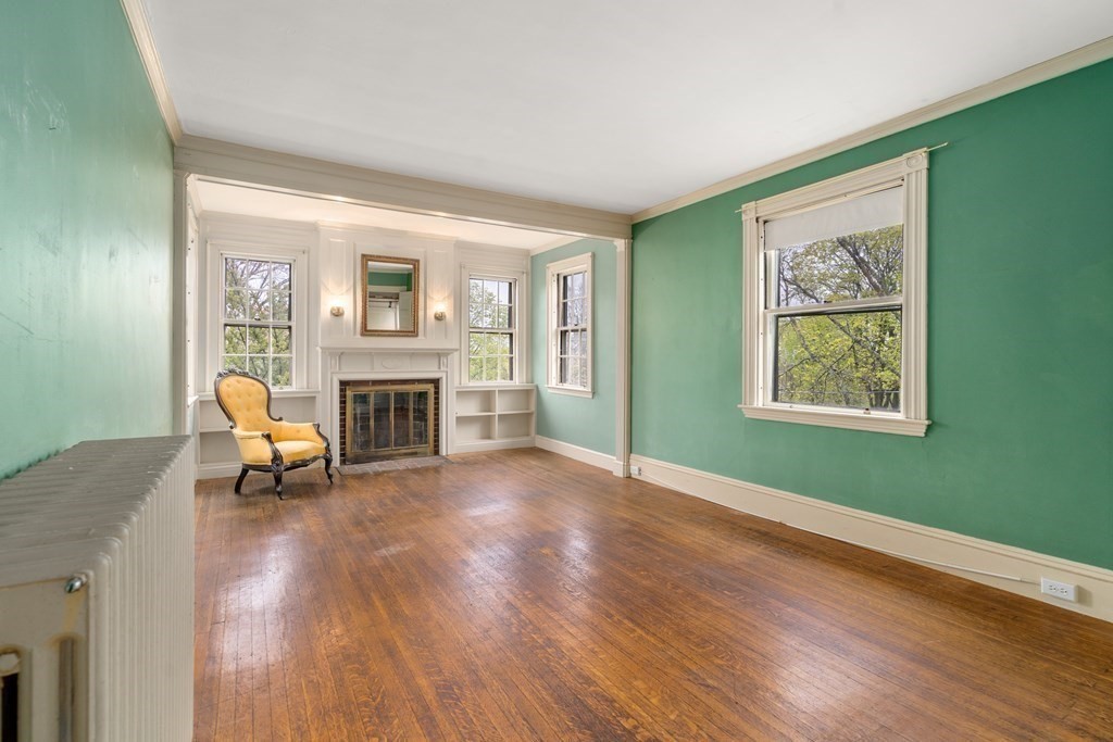 13 Ravine Street Arlington, MA 02476 - Photo 25 of 42 a living room with furniture and a fireplace
