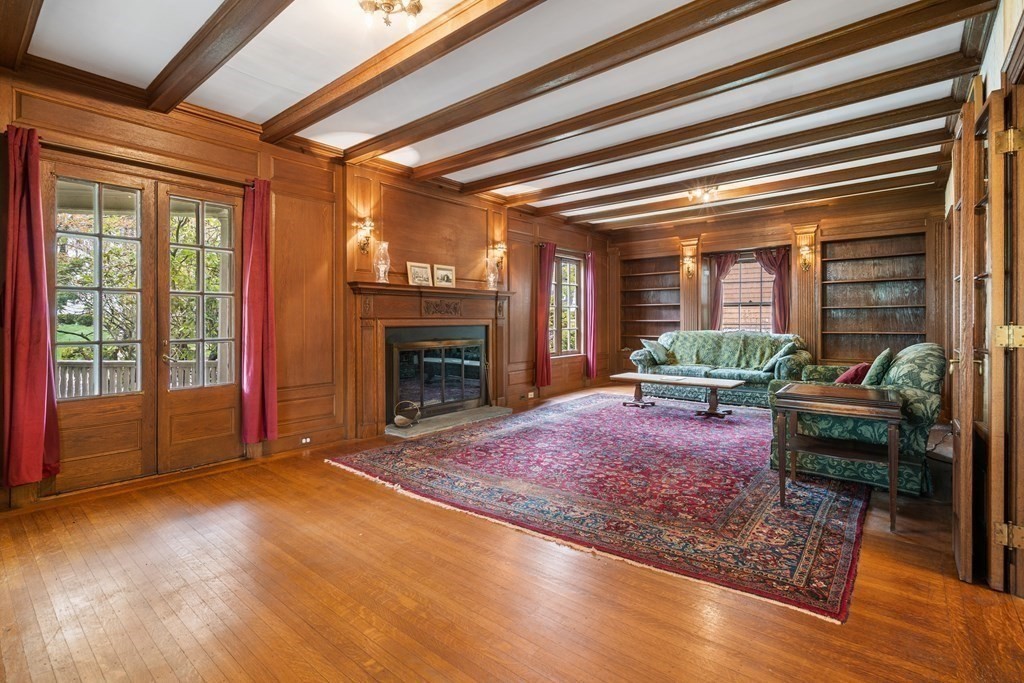 13 Ravine Street Arlington, MA 02476 - Photo 4 of 42 a living room with furniture and a fireplace
