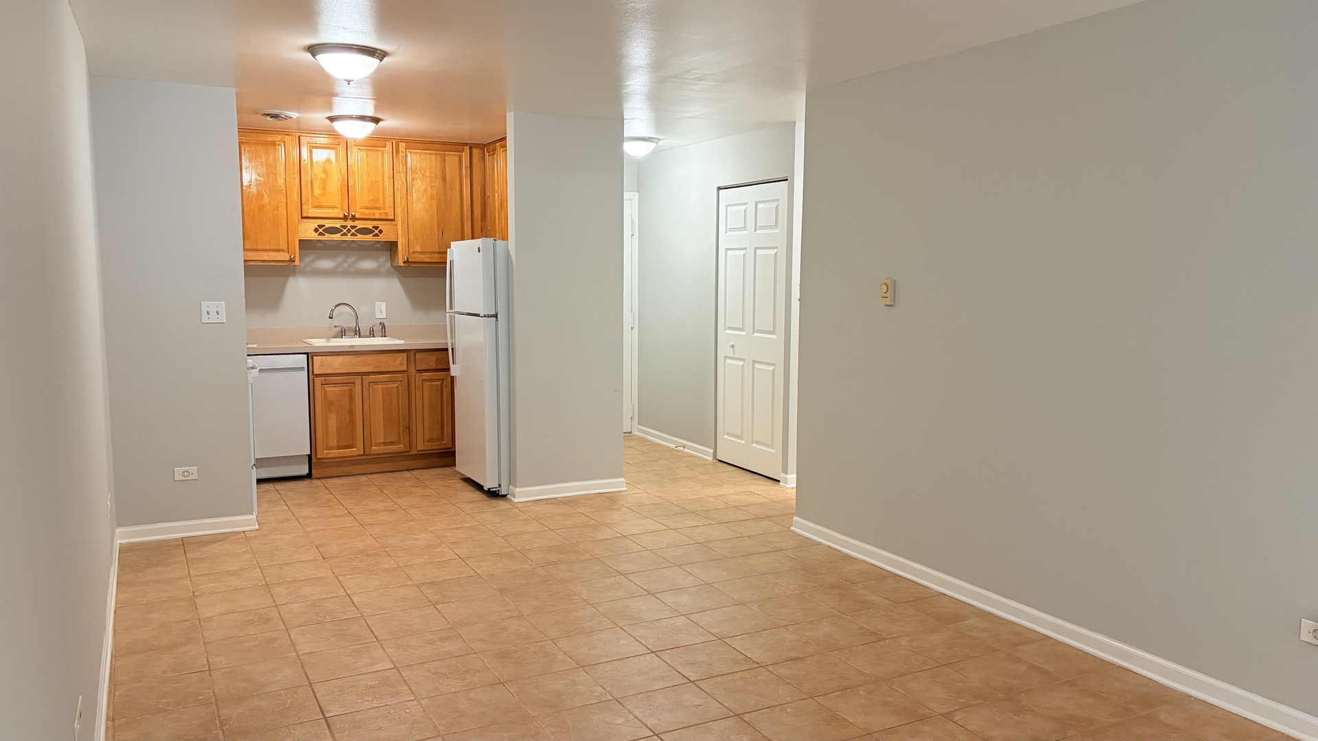 310 Lathrop Avenue, Unit 307 Forest Park, IL 60130 - Photo 22 of 41 an empty room with a window and kitchen view