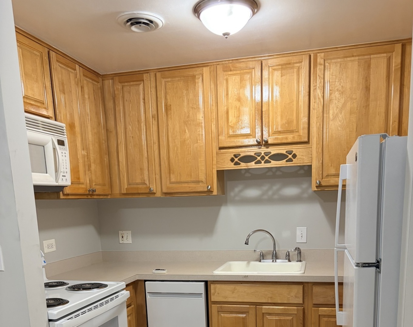 310 Lathrop Avenue, Unit 307 Forest Park, IL 60130 - Photo 23 of 41 a kitchen with stainless steel appliances a sink and cabinets