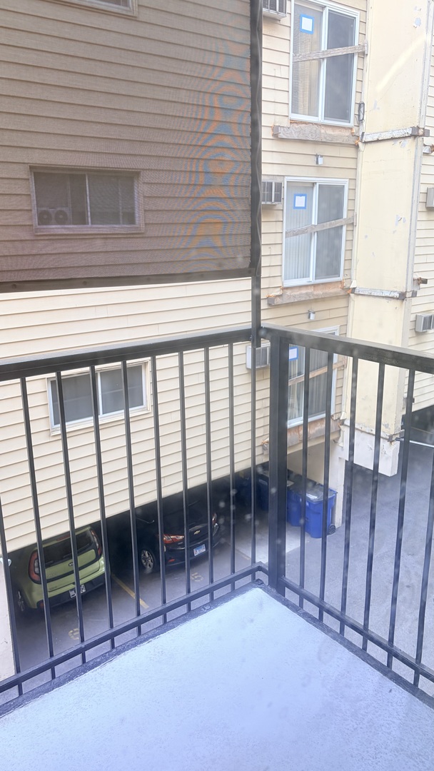 310 Lathrop Avenue, Unit 307 Forest Park, IL 60130 - Photo 25 of 41 a view of a balcony with chairs