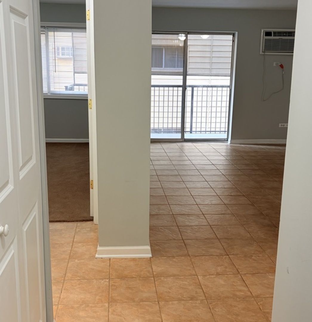 310 Lathrop Avenue, Unit 307 Forest Park, IL 60130 - Photo 27 of 41 a view of an empty room with a window