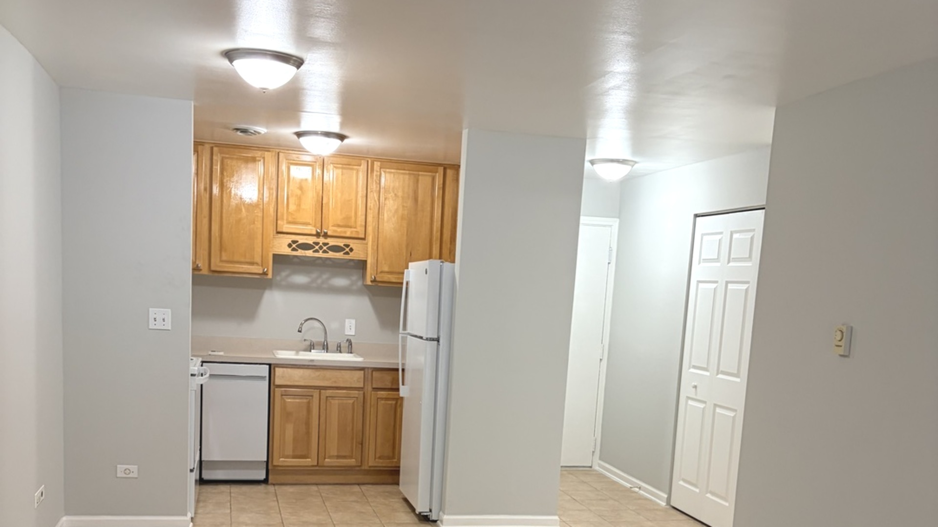 310 Lathrop Avenue, Unit 307 Forest Park, IL 60130 - Photo 29 of 41 a bathroom with a granite countertop sink and a mirror