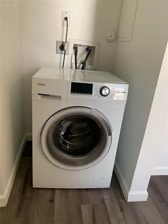 a bathroom with a sink mirror and vanity