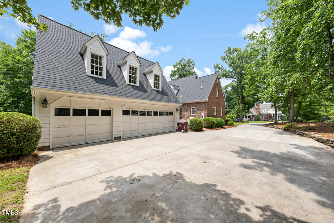305 Lochridge Drive Roxboro, NC 27573 - Photo 32 of 42 Side entry garage