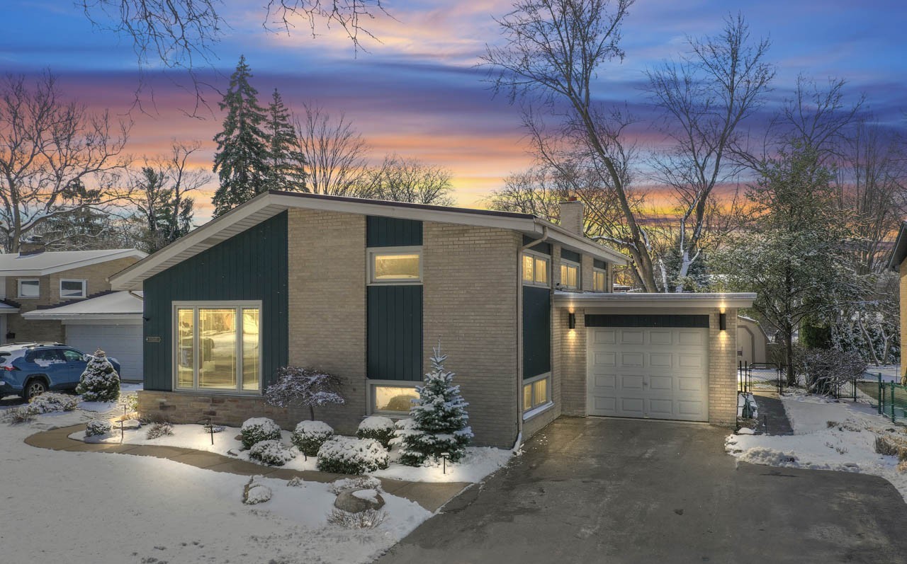 5 East Sunset Road Mount Prospect, IL 60056 - Photo 1 of 46 a front view of a house with a yard
