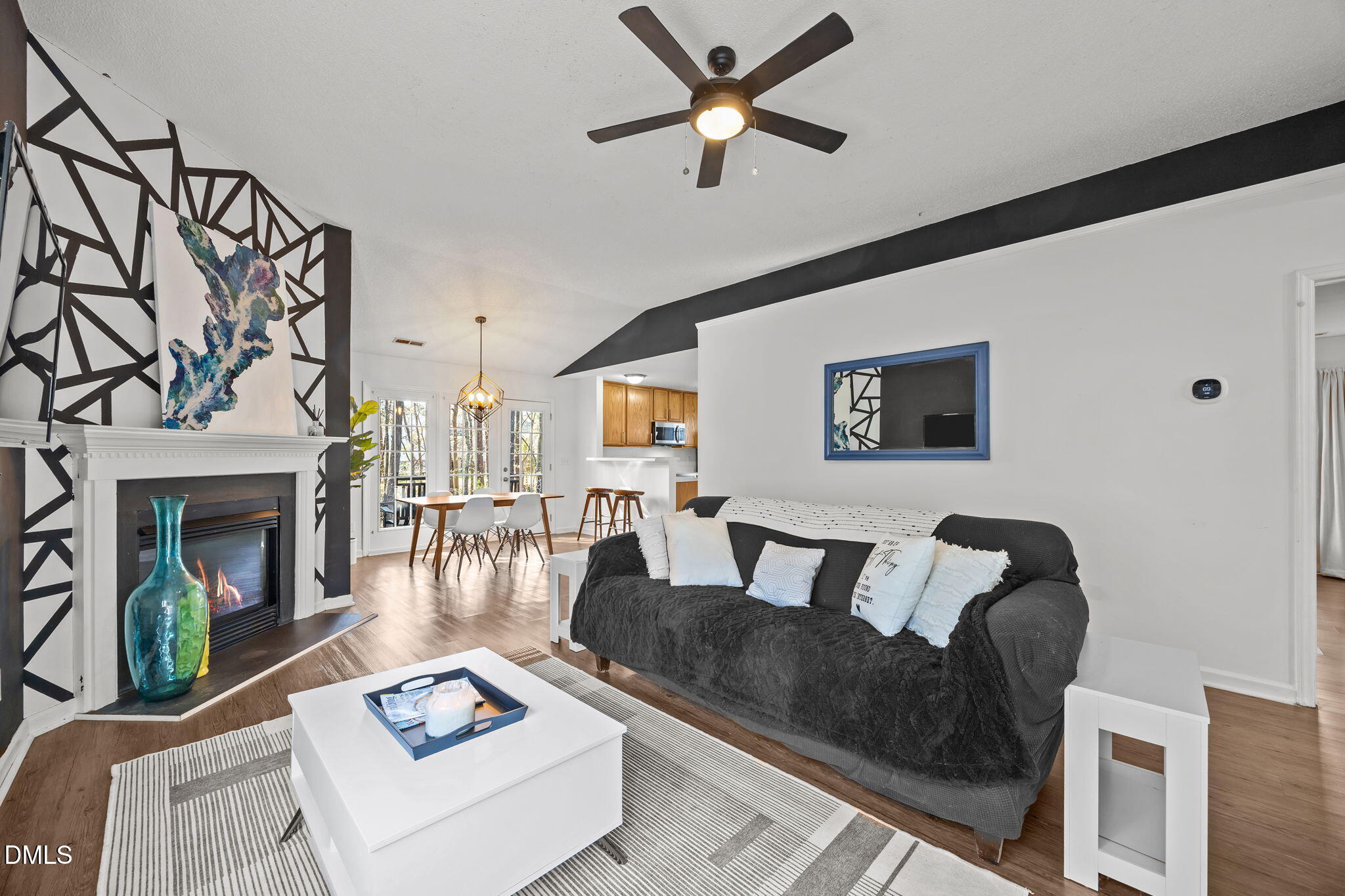 2208 Walnut Ridge Court Raleigh, NC 27610 - Photo 11 of 24 a living room with furniture and a fireplace