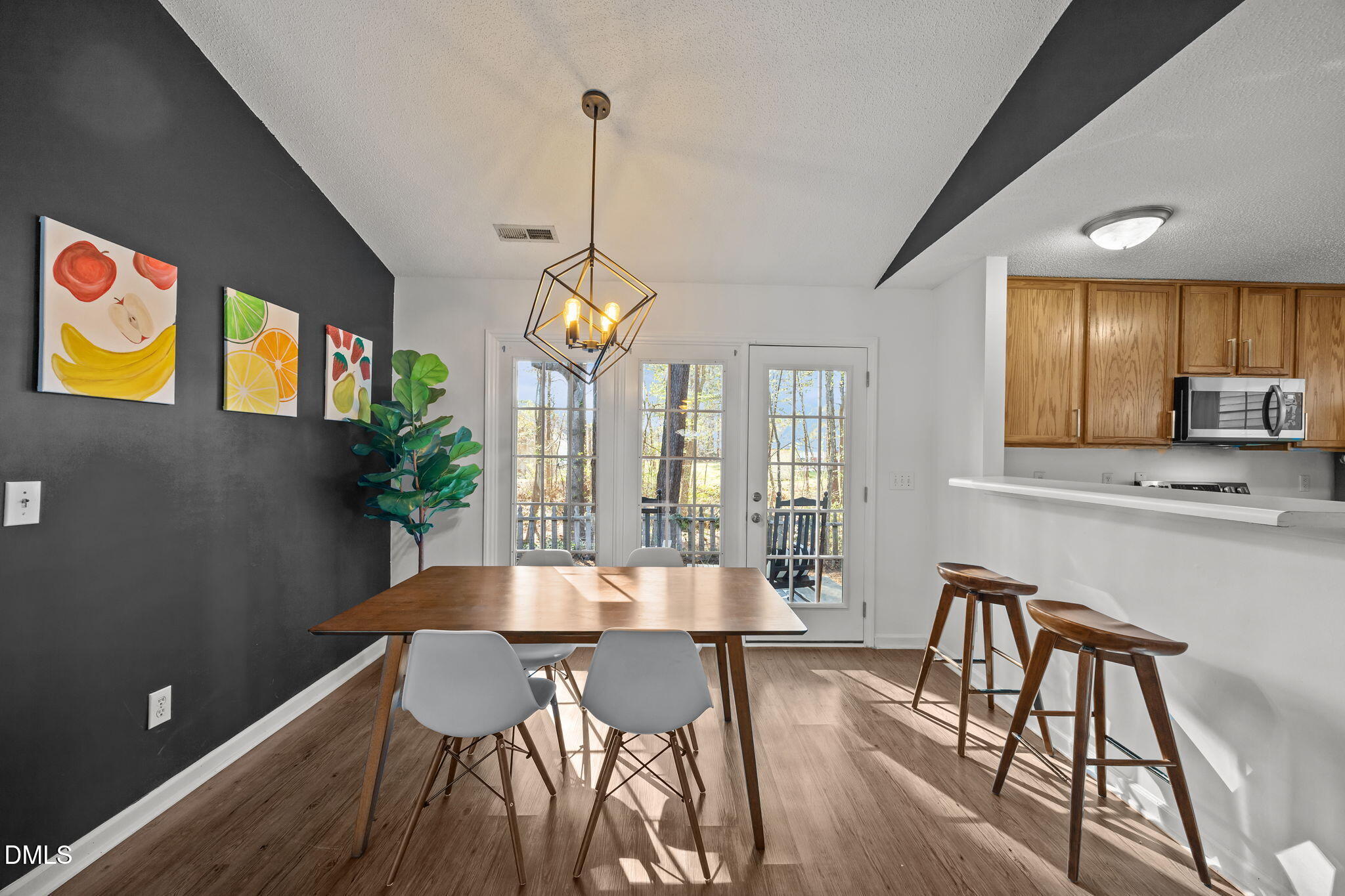 2208 Walnut Ridge Court Raleigh, NC 27610 - Photo 14 of 24 a view of a dining room with furniture window and wooden floor