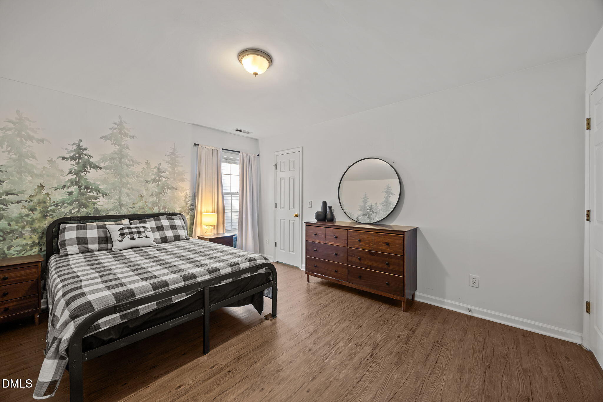 2208 Walnut Ridge Court Raleigh, NC 27610 - Photo 19 of 24 a bedroom with bed and a window
