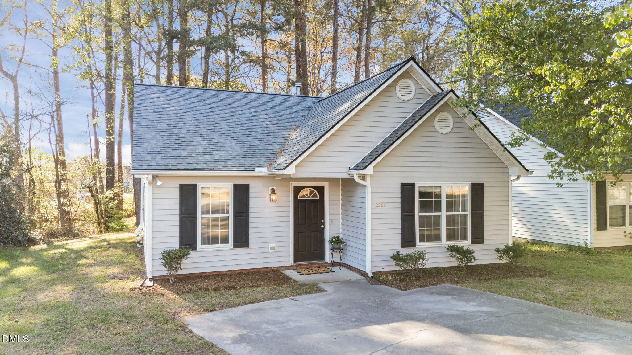 2208 Walnut Ridge Court Raleigh, NC 27610 - Photo 2 of 24 a view of a house with a yard