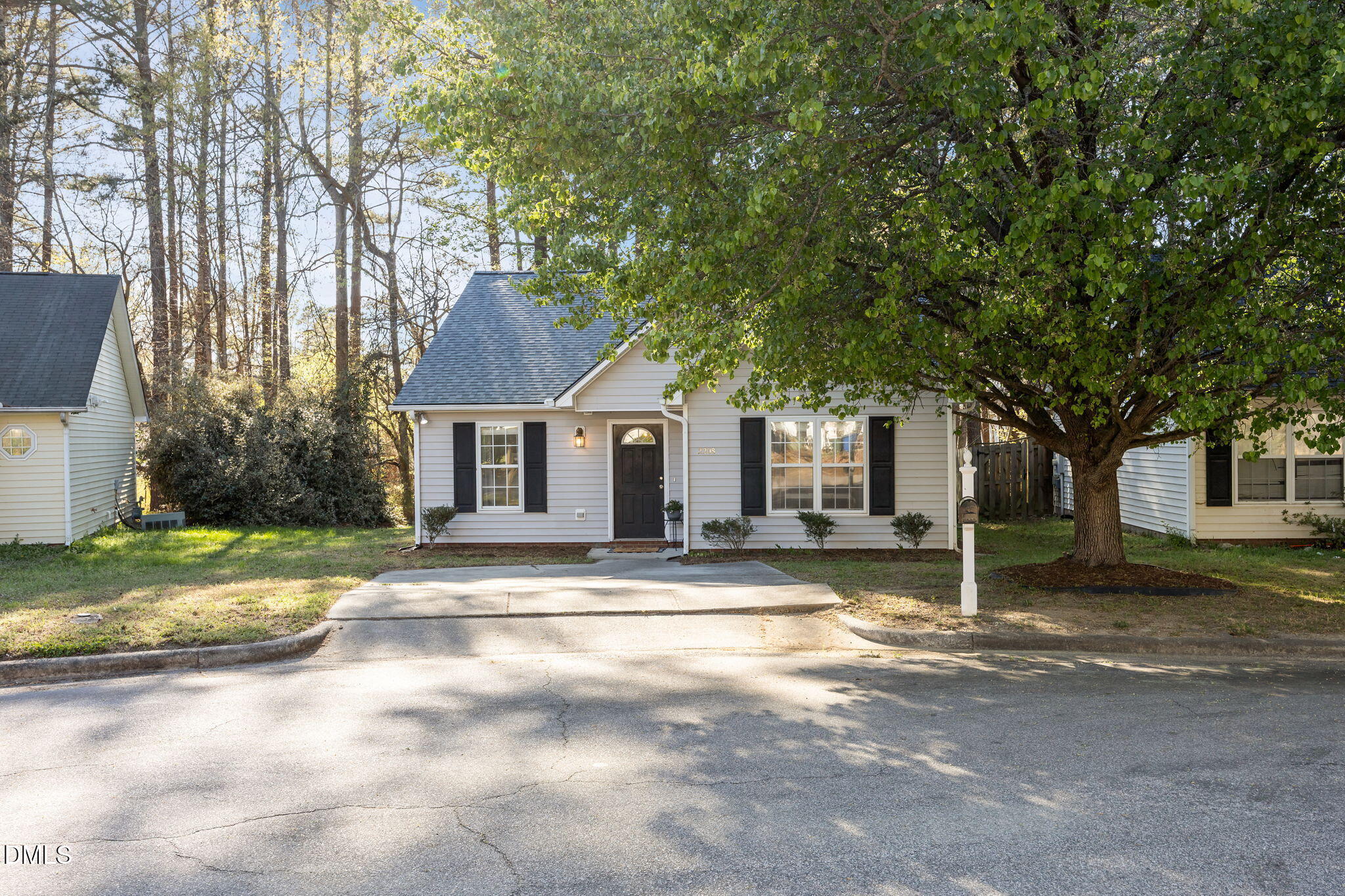2208 Walnut Ridge Court Raleigh, NC 27610 - Photo 5 of 24 a view of a house with a yard and large tree