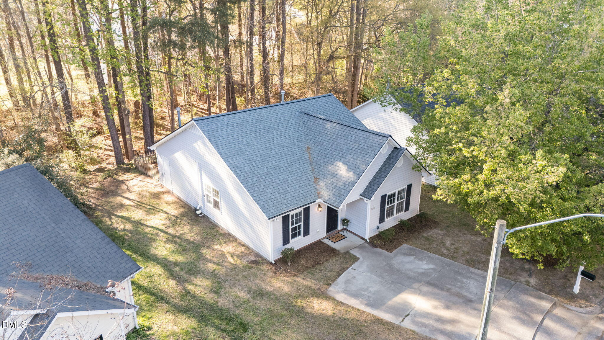2208 Walnut Ridge Court Raleigh, NC 27610 - Photo 6 of 24 a view of house along with trees and stairs