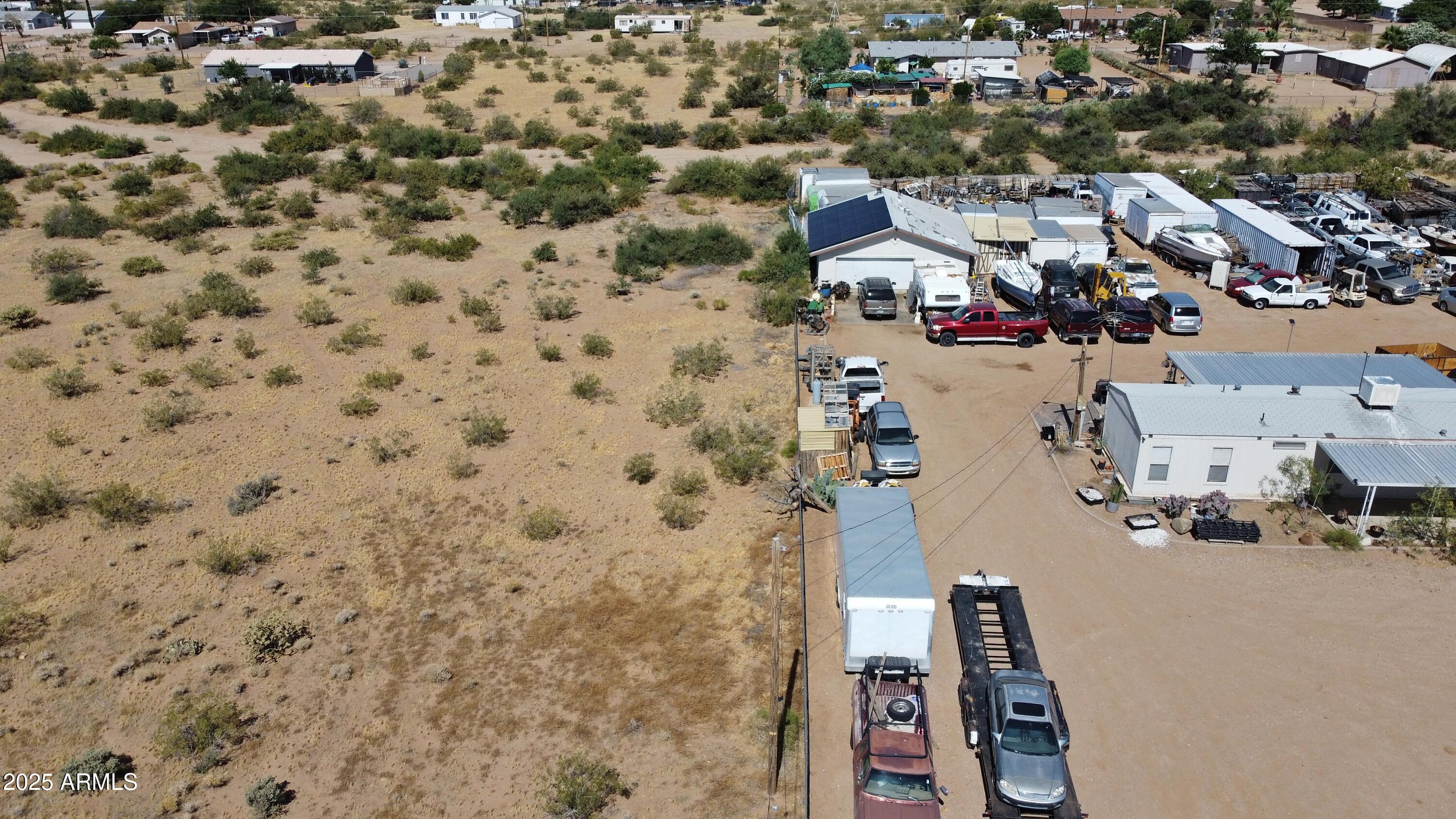 Lot 5 North N1/2 N Magma Road, Unit 5 Golden Valley, AZ 86413 - Photo 3 of 6 an aerial view of residential houses with outdoor space