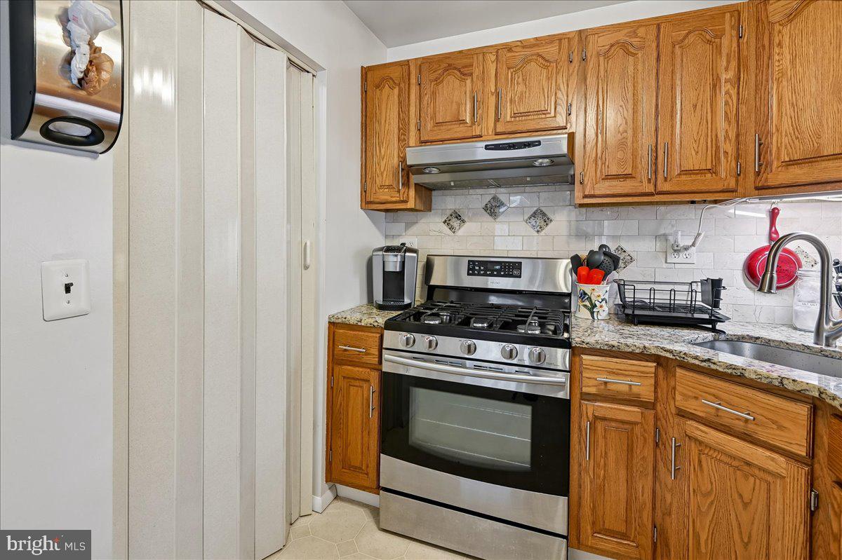 1731 Tacoma Road Edgewater, MD 21037 - Photo 28 of 59 Cozy kitchen with warm wood accents.