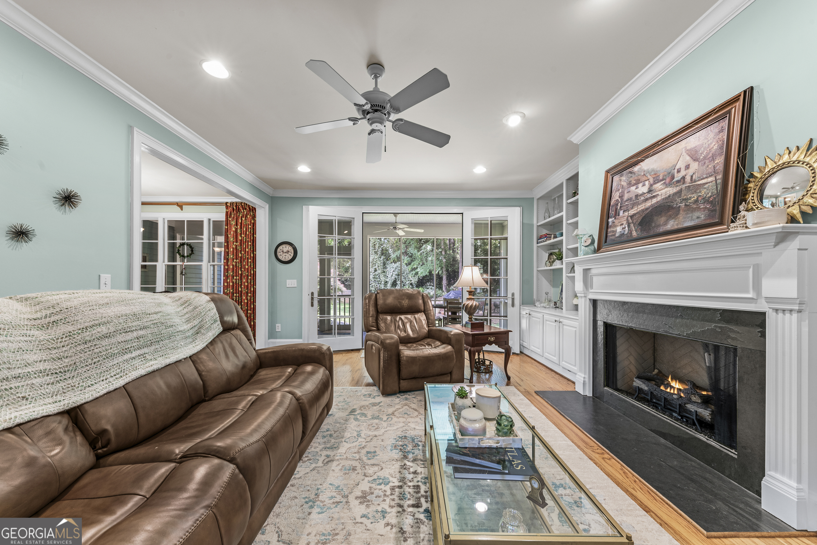 524 Hillside Road Madison, GA 30650 - Photo 12 of 54 a living room with furniture and a fireplace