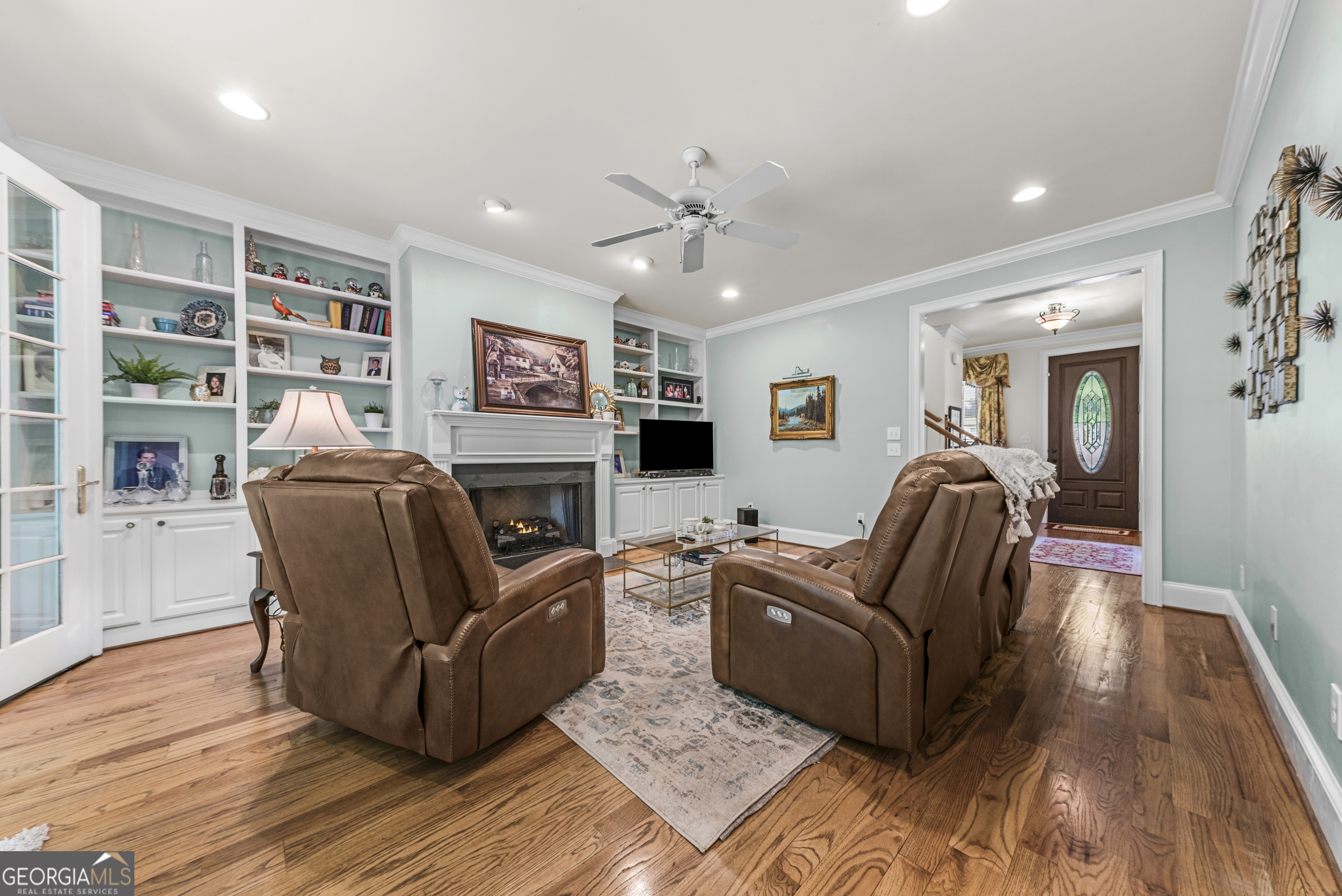 524 Hillside Road Madison, GA 30650 - Photo 15 of 54 a living room with furniture and a flat screen tv