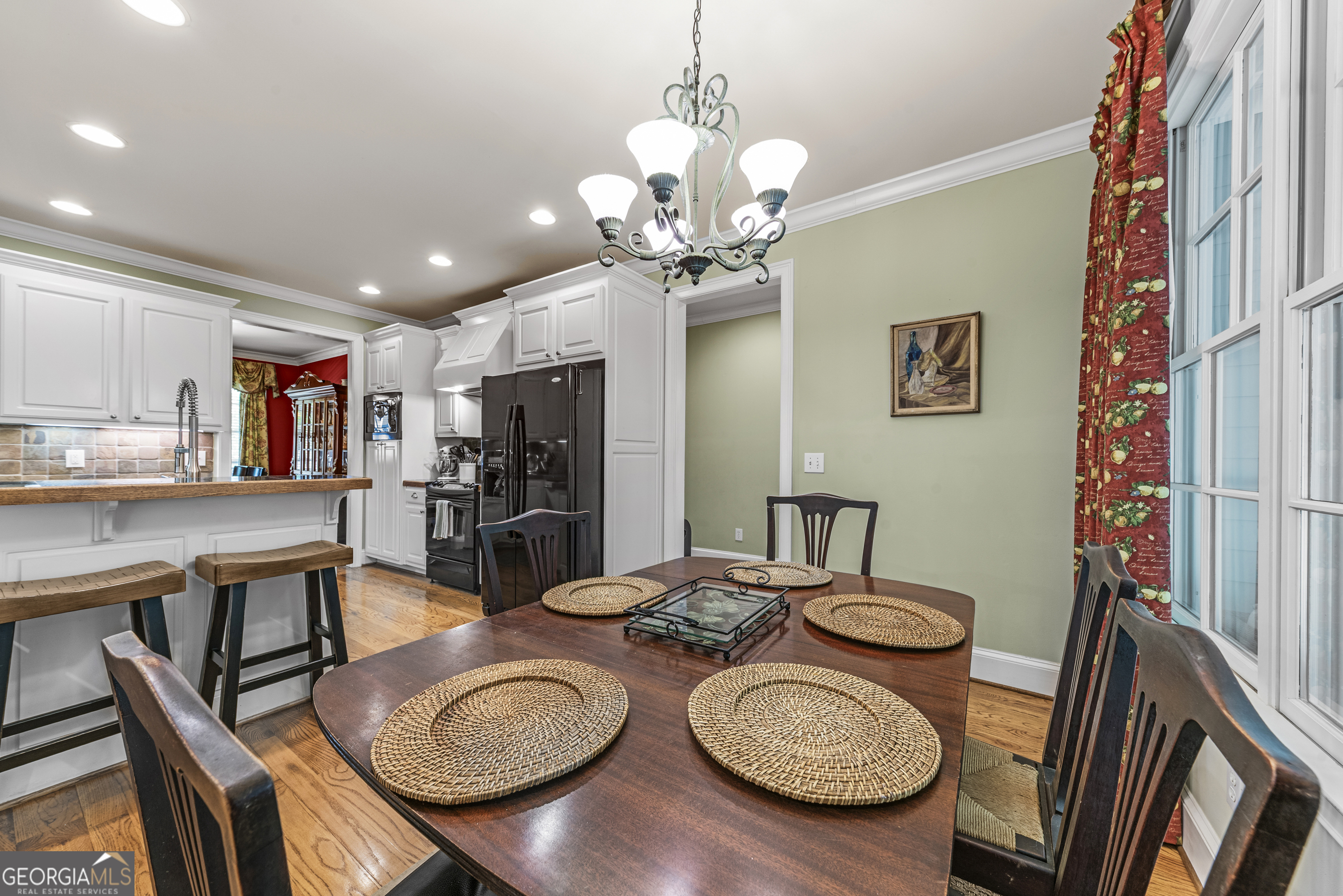 524 Hillside Road Madison, GA 30650 - Photo 17 of 54 a view of a dining room with furniture