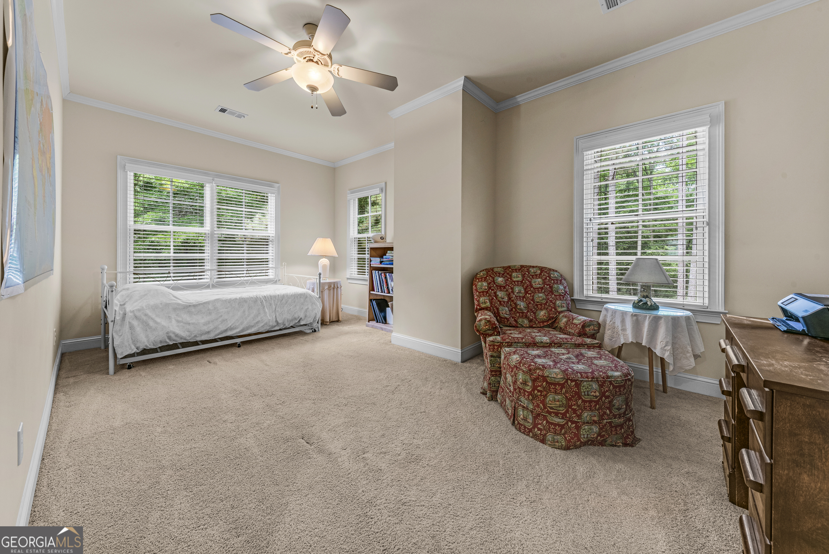 524 Hillside Road Madison, GA 30650 - Photo 31 of 54 a living room with furniture and a large window
