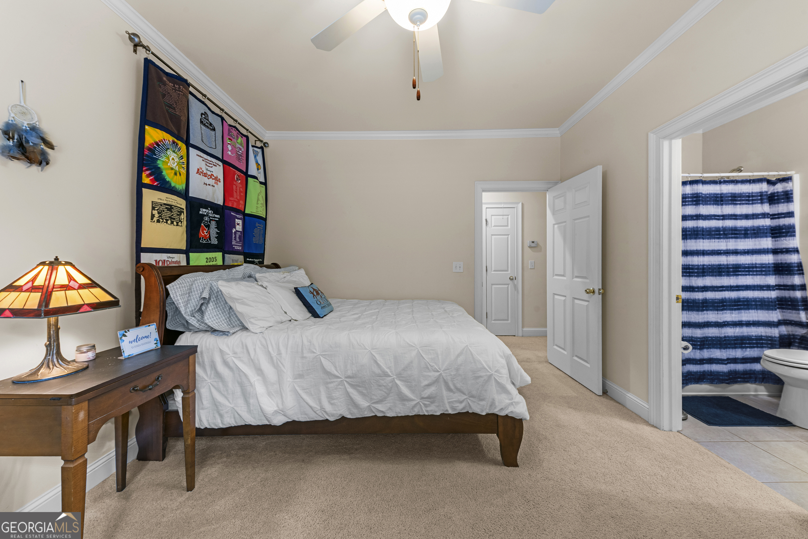 524 Hillside Road Madison, GA 30650 - Photo 35 of 54 a bedroom with a bed and a cabinets