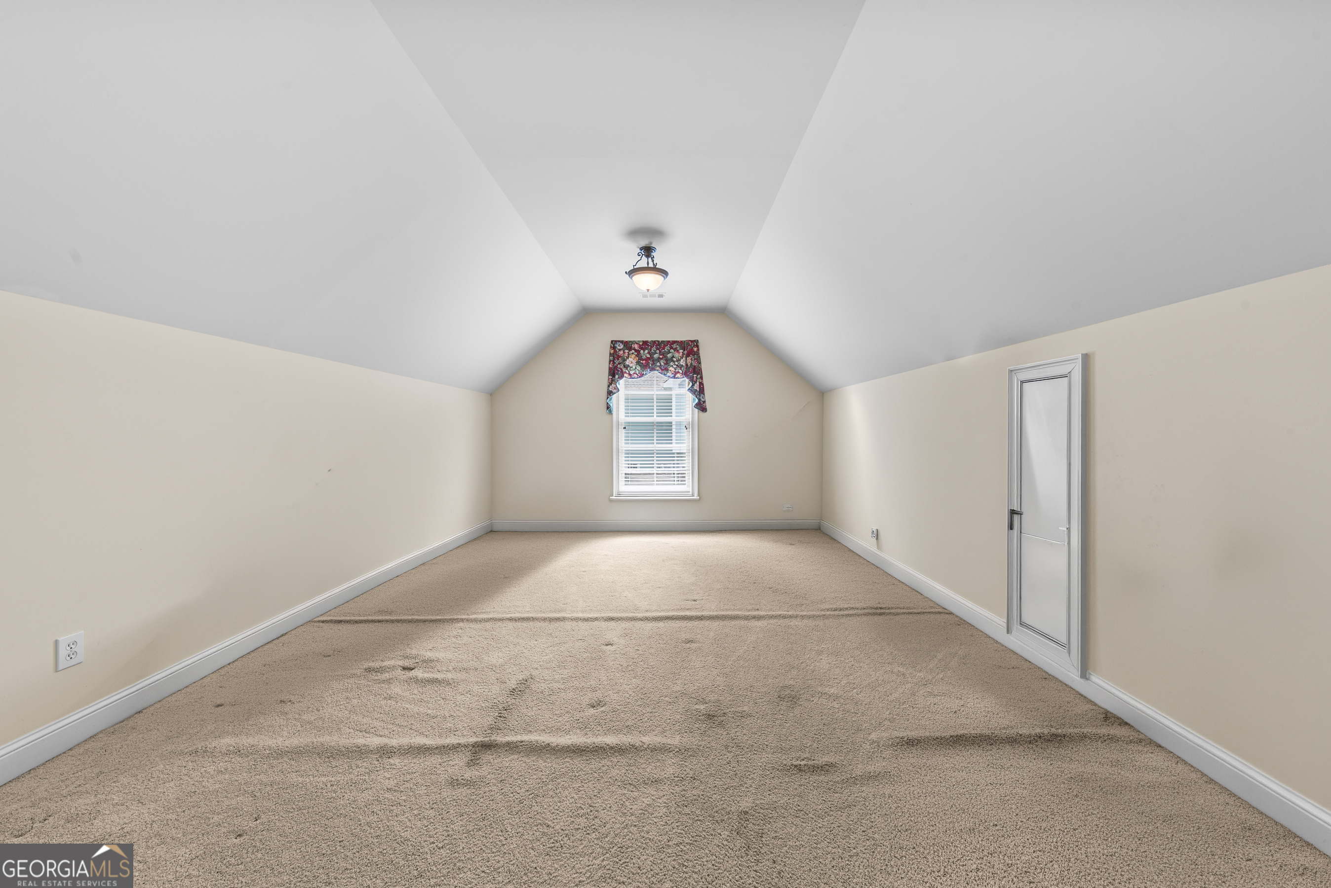 524 Hillside Road Madison, GA 30650 - Photo 37 of 54 a view of an empty room with a window