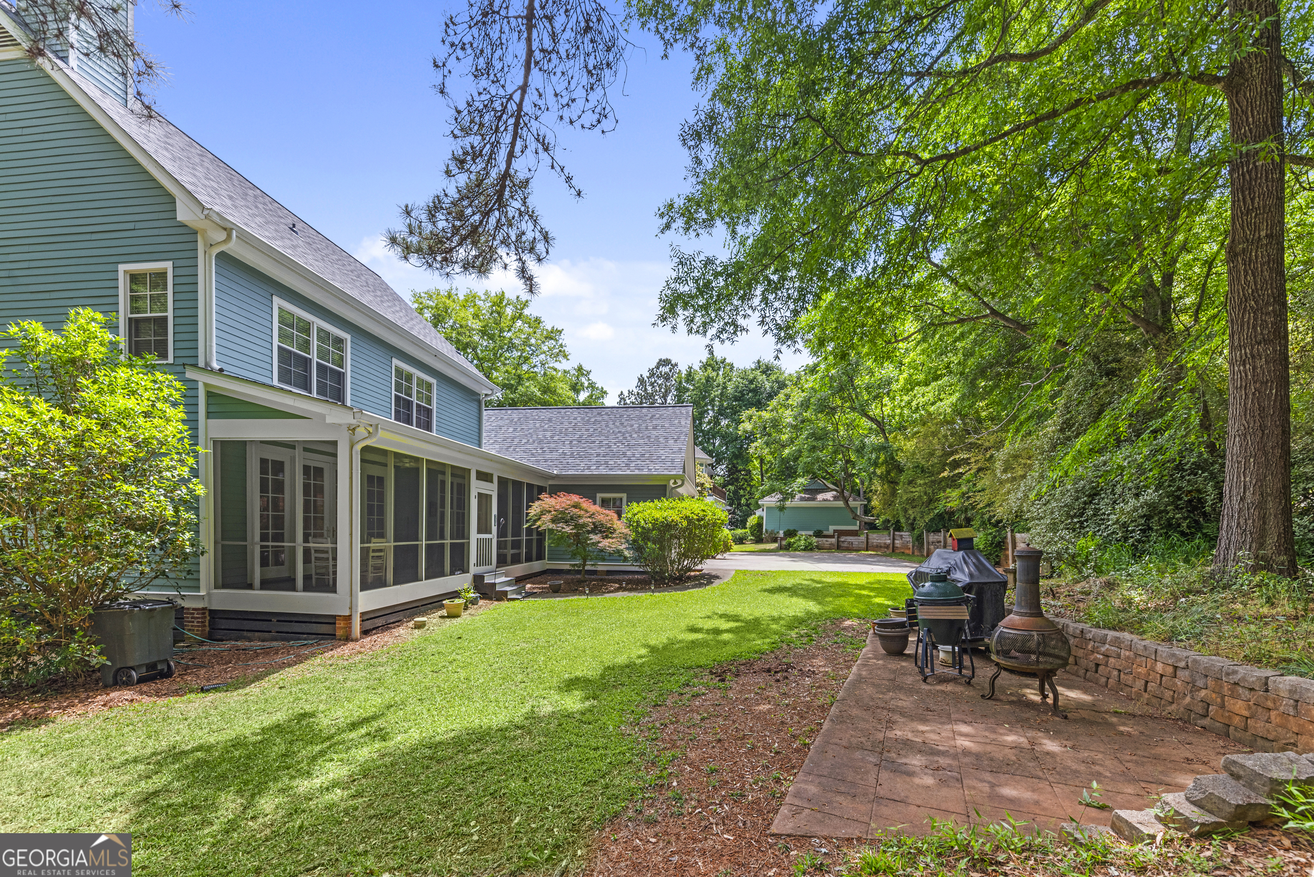 524 Hillside Road Madison, GA 30650 - Photo 50 of 54 a view of a house with backyard porch and sitting area