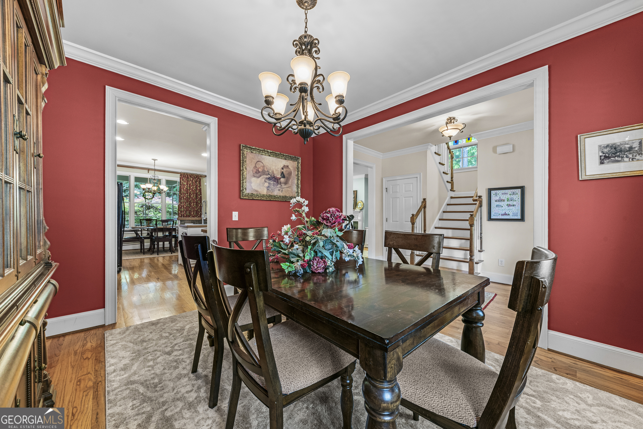 524 Hillside Road Madison, GA 30650 - Photo 10 of 54 a view of a dining room with furniture and chandelier