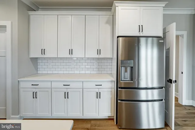 a bathroom with a sink toilet and mirror