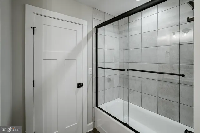 a view of a wooden balcony with a yard