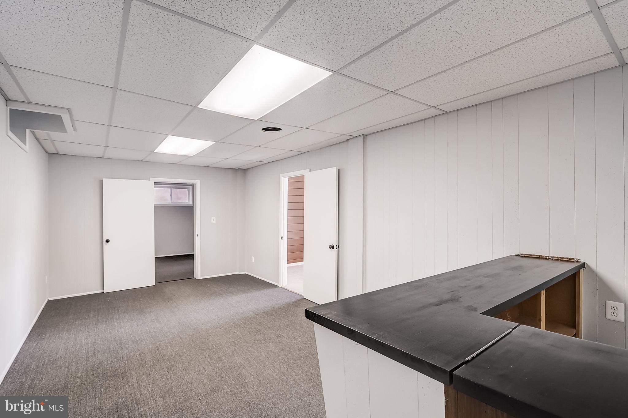 2416 Bel Pre Road Silver Spring, MD 20906 - Photo 31 of 58 Great room with bar