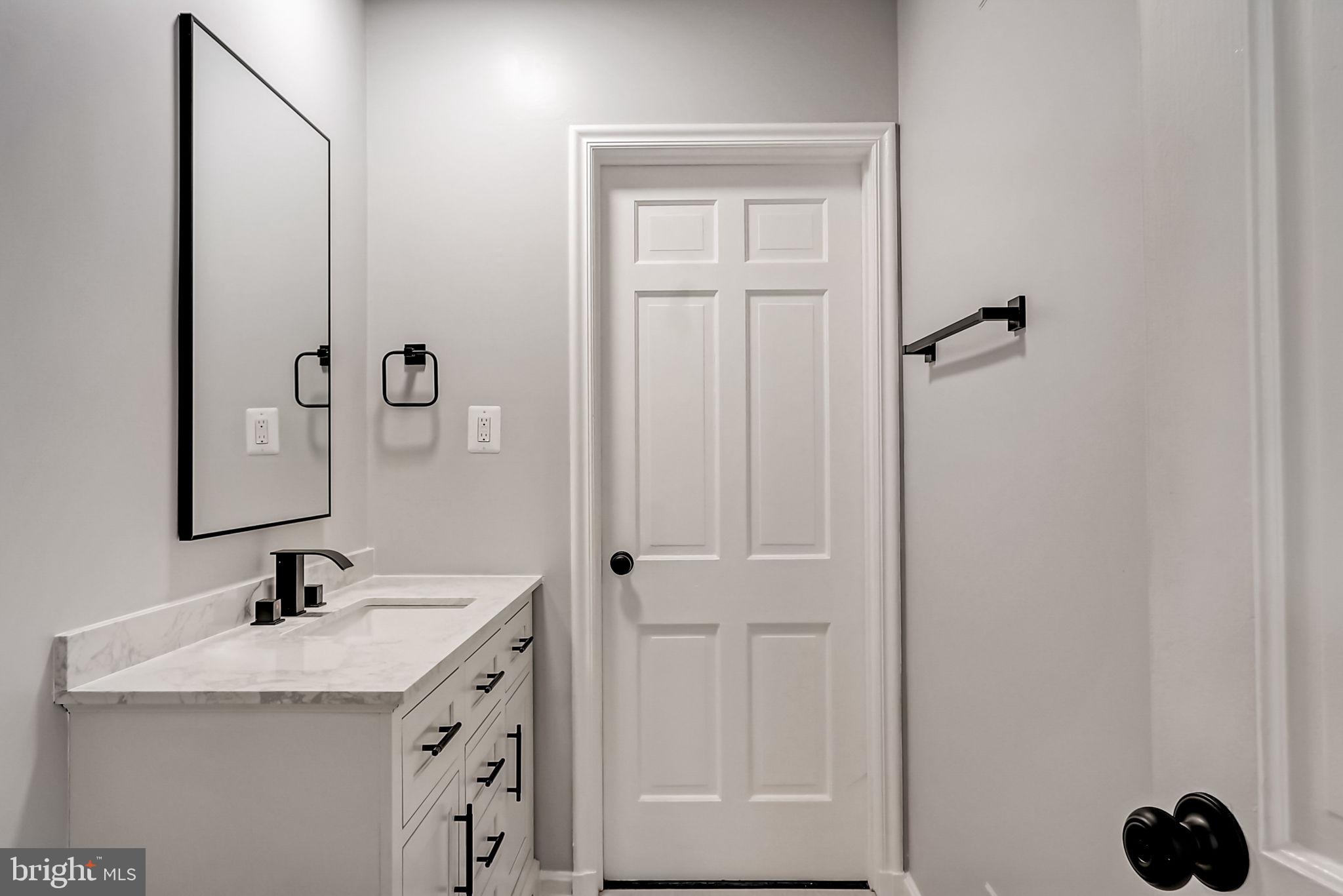 2416 Bel Pre Road Silver Spring, MD 20906 - Photo 37 of 58 Main level half bath