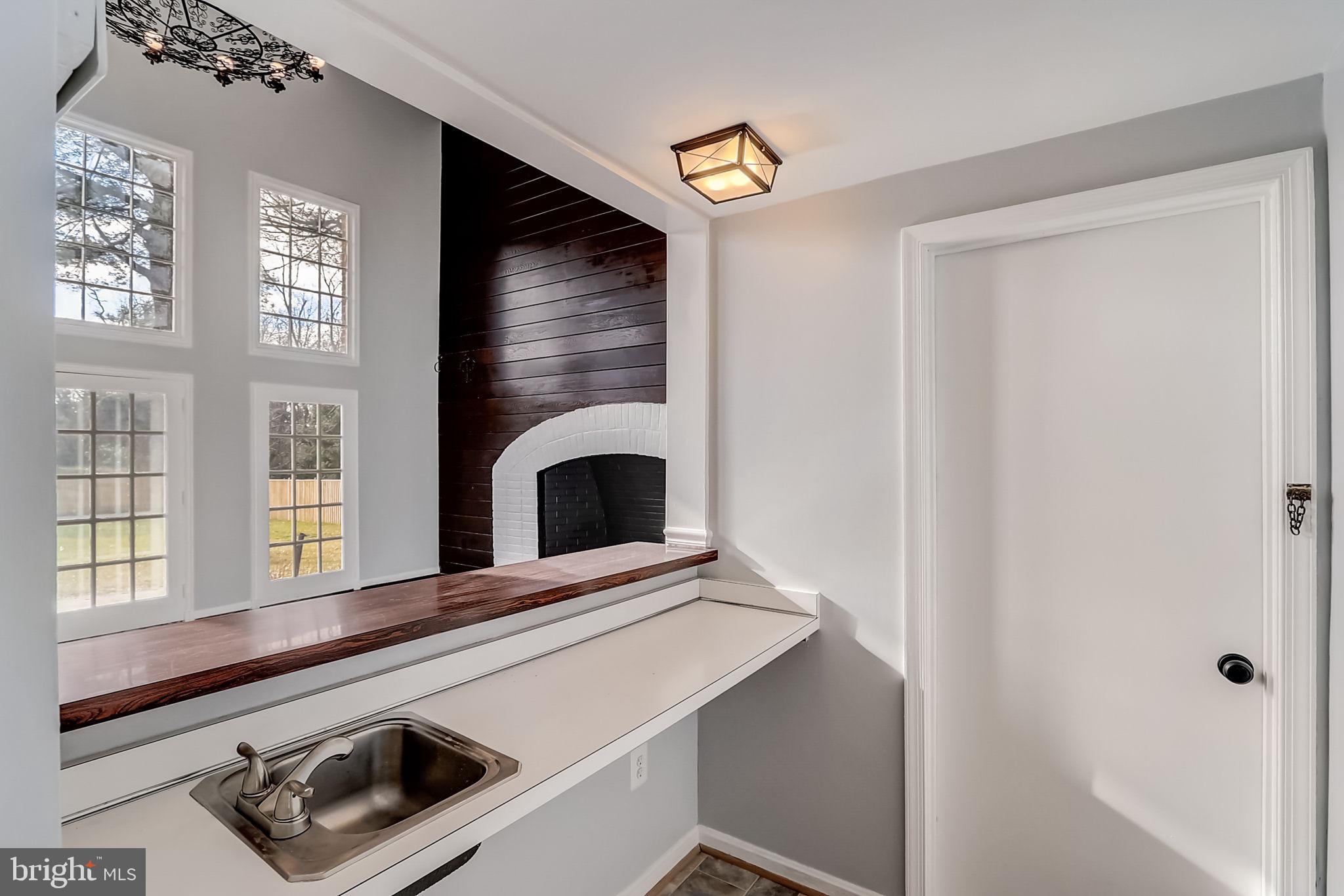 2416 Bel Pre Road Silver Spring, MD 20906 - Photo 39 of 58 Family room wet bar