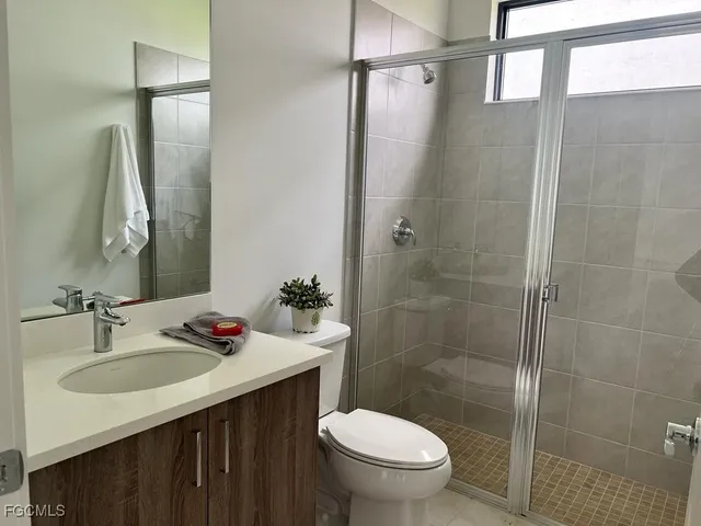 a bathroom with a sink and mirror