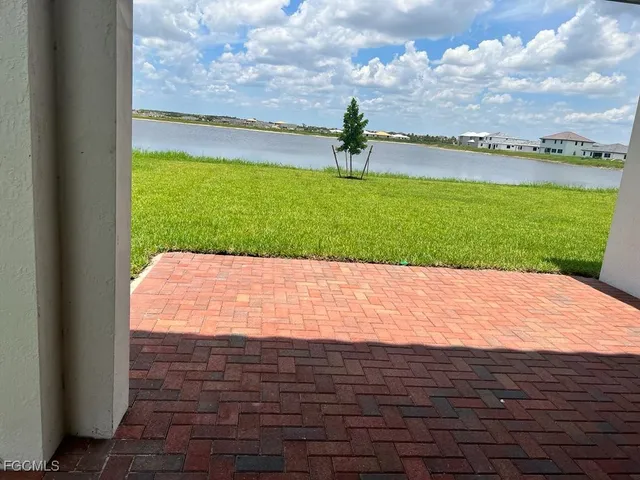 a view of swimming pool from a yard