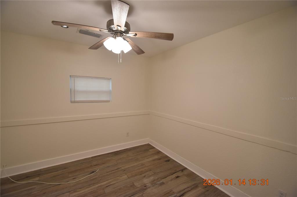 907 East Patterson Street Tampa, FL 33604 - Photo 15 of 35 wooden floor in an empty room