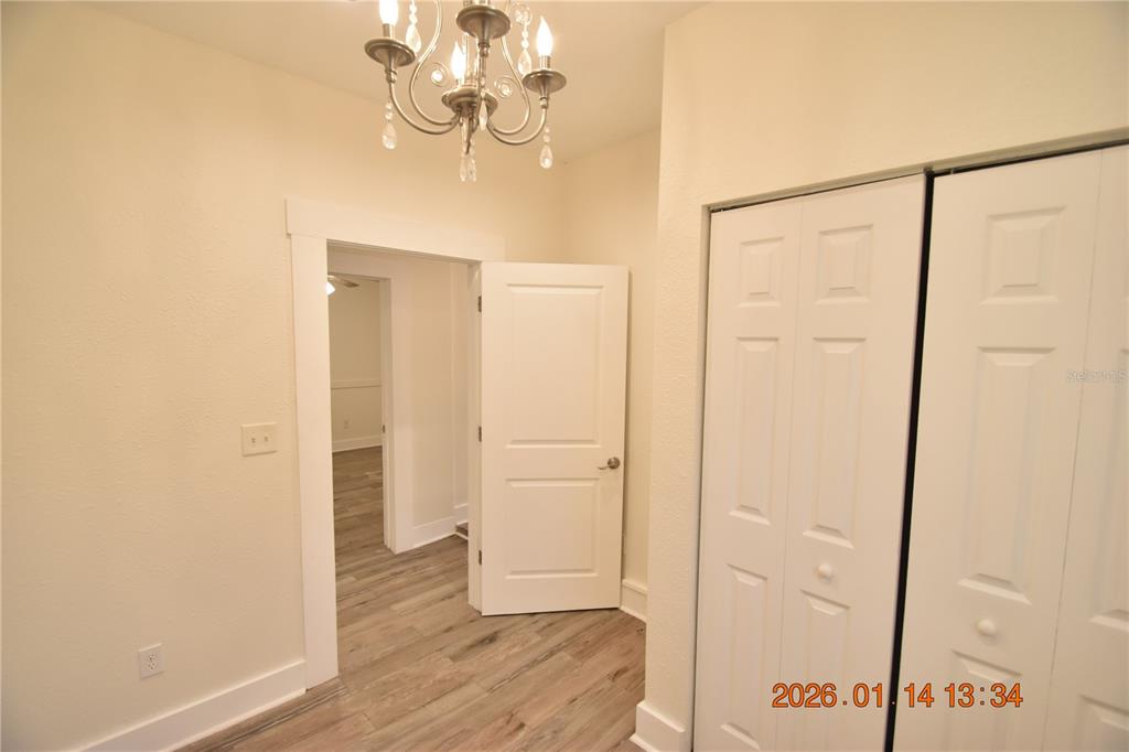 907 East Patterson Street Tampa, FL 33604 - Photo 24 of 35 a view of a hallway with wooden floor