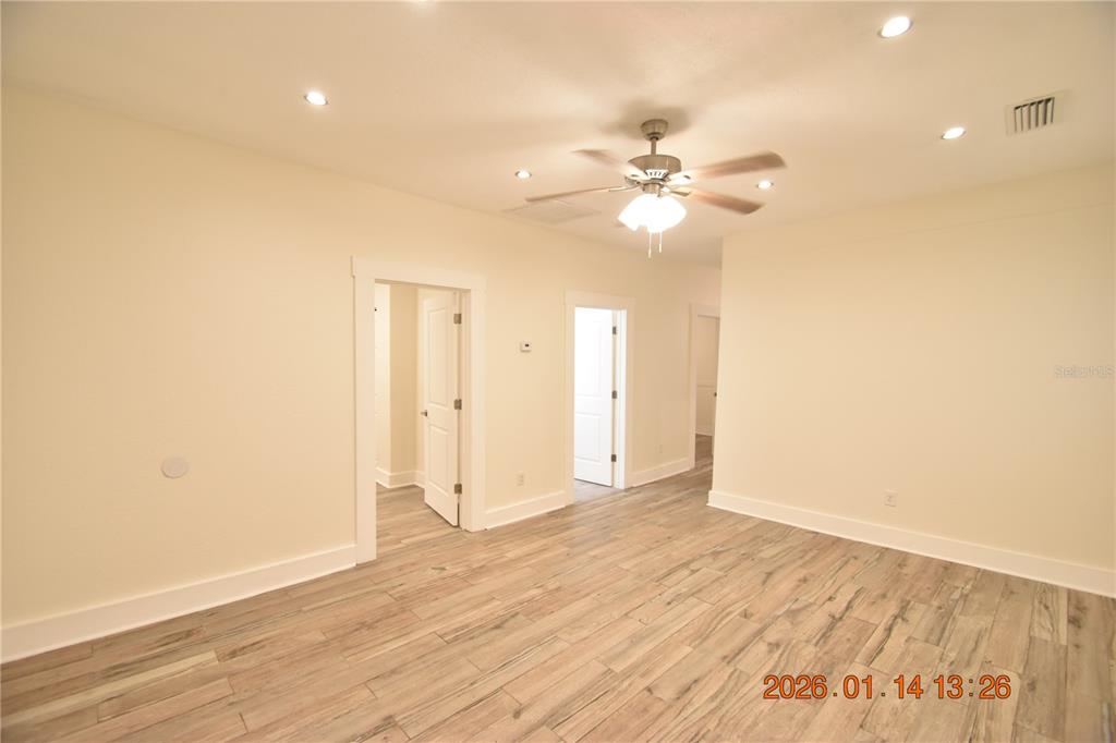 907 East Patterson Street Tampa, FL 33604 - Photo 3 of 35 a view of an empty room with a window