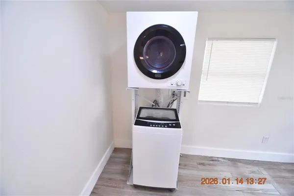 a kitchen with a stove and a microwave