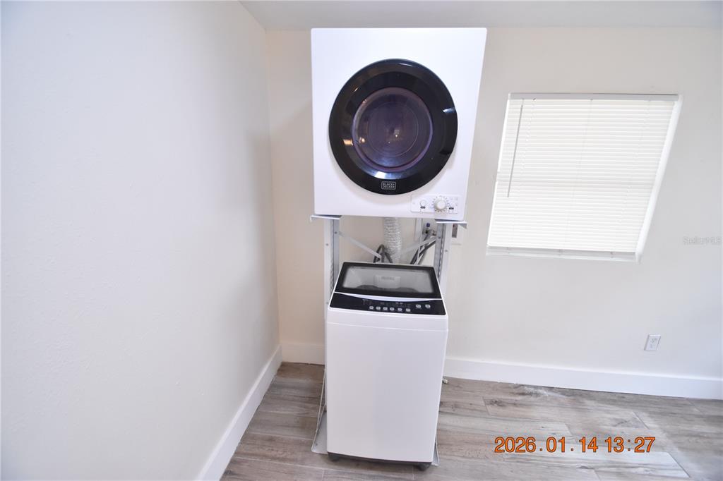 907 East Patterson Street Tampa, FL 33604 - Photo 10 of 35 a kitchen with a stove and a microwave
