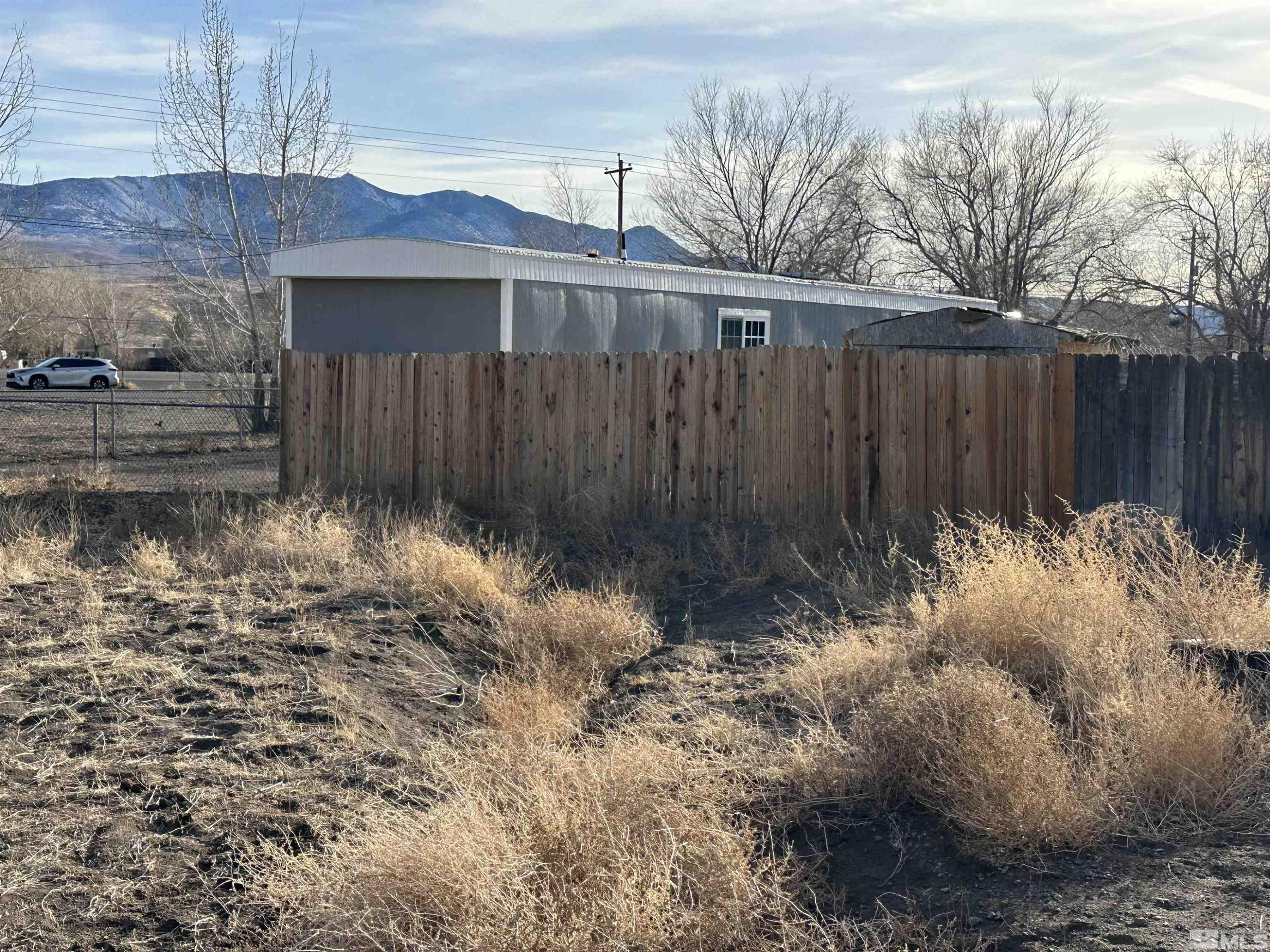 7060 Highway 50 Dayton, NV 89403 - Photo 12 of 40 a backyard of a house with lots of green space