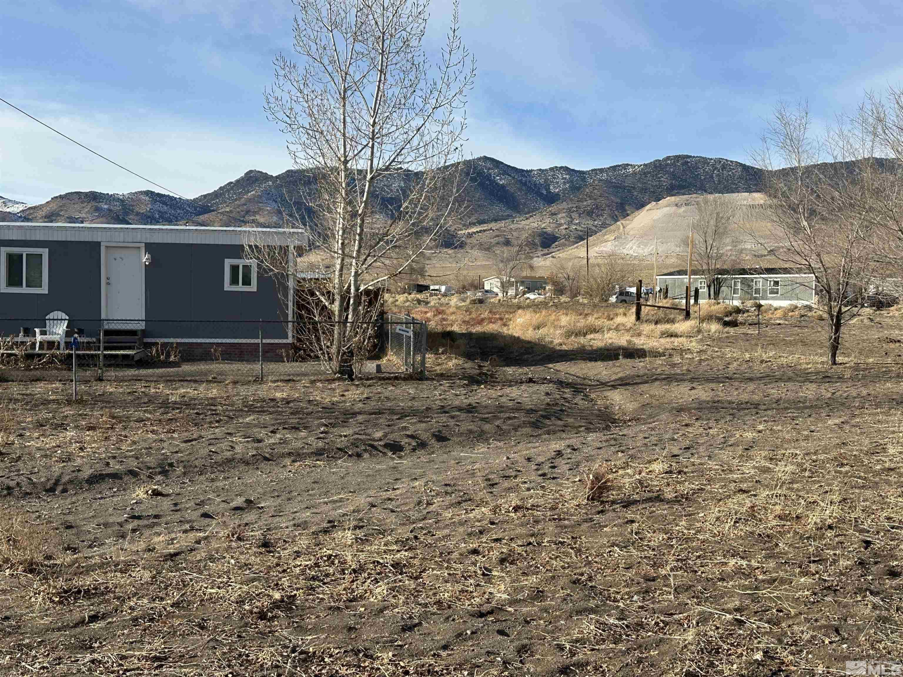 7060 Highway 50 Dayton, NV 89403 - Photo 14 of 40 a view of a house with a yard