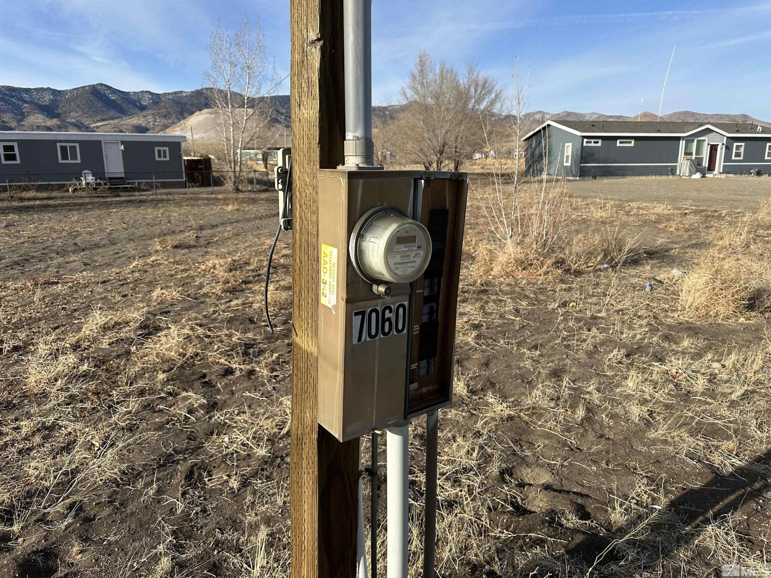 7060 Highway 50 Dayton, NV 89403 - Photo 22 of 40 a front view of a house with parking space