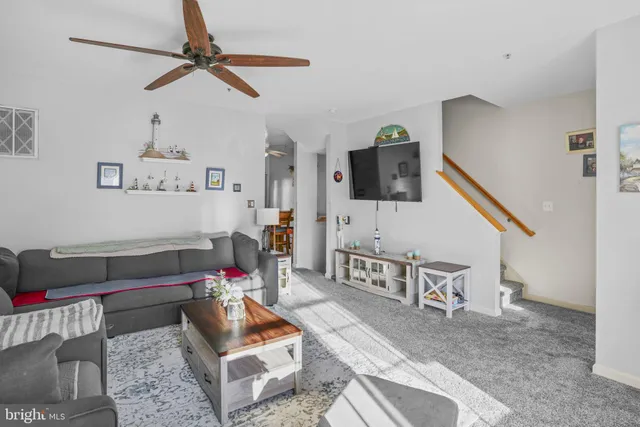 a living room with furniture and a couch