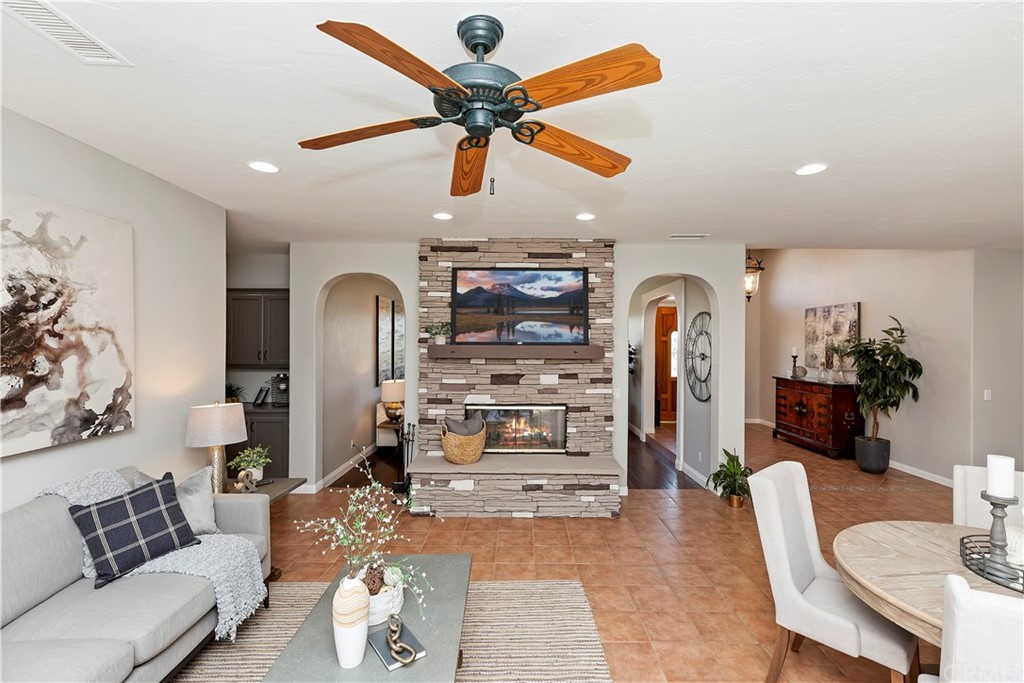 33425 Monte Verde Temecula, CA 92592 - Photo 22 of 68 a living room with furniture and a ceiling fan