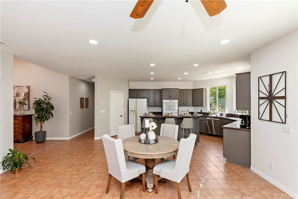 33425 Monte Verde Temecula, CA 92592 - Photo 23 of 68 a view of a dining room with furniture