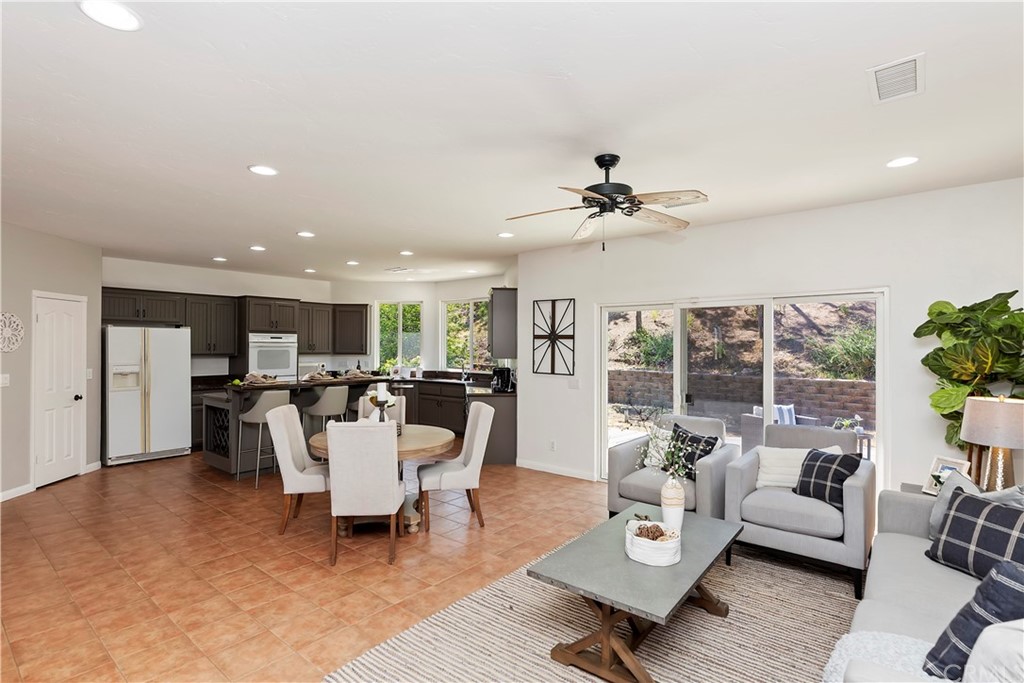 33425 Monte Verde Temecula, CA 92592 - Photo 24 of 68 a living room with furniture and a large window