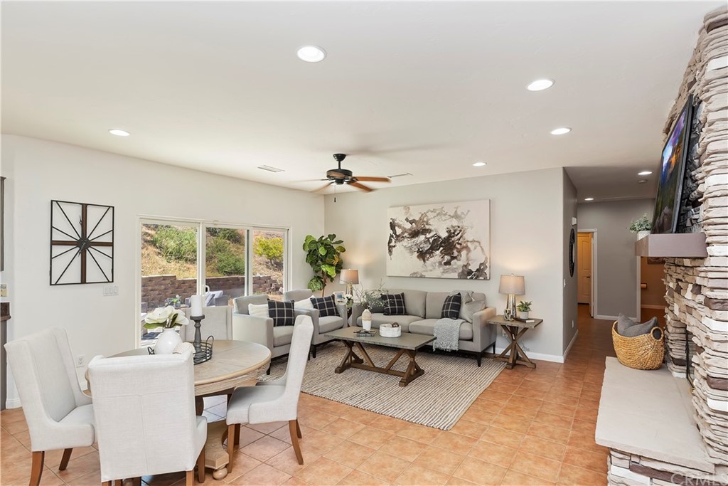 33425 Monte Verde Temecula, CA 92592 - Photo 25 of 68 a living room with furniture and a large window