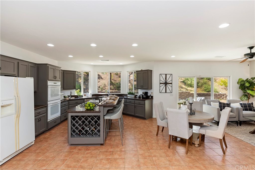 33425 Monte Verde Temecula, CA 92592 - Photo 26 of 68 a view of a dining room with furniture window and outside view